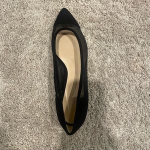 Barney’s black flats